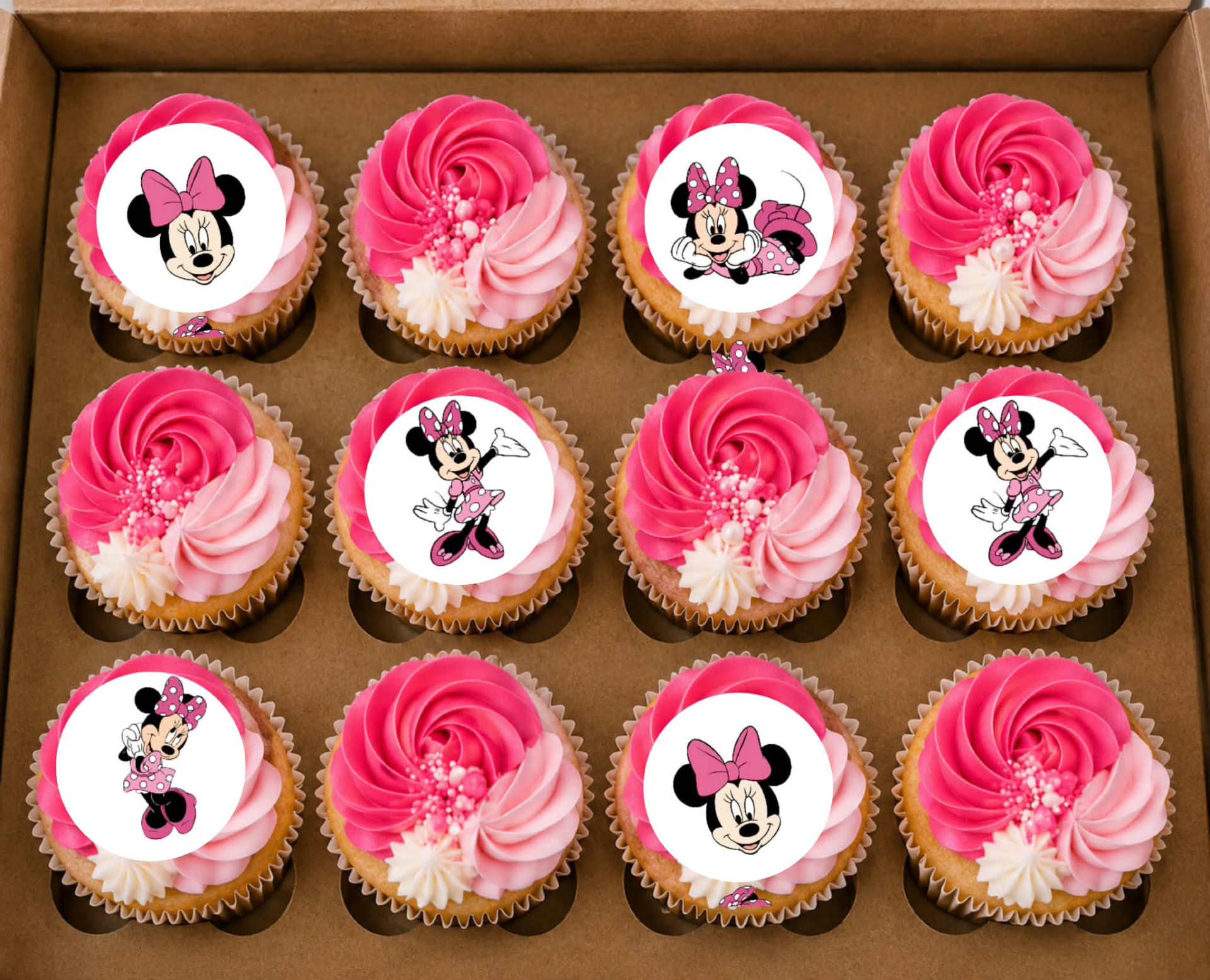 Custom celebration cupcakes styled to a client's colour palette and theme